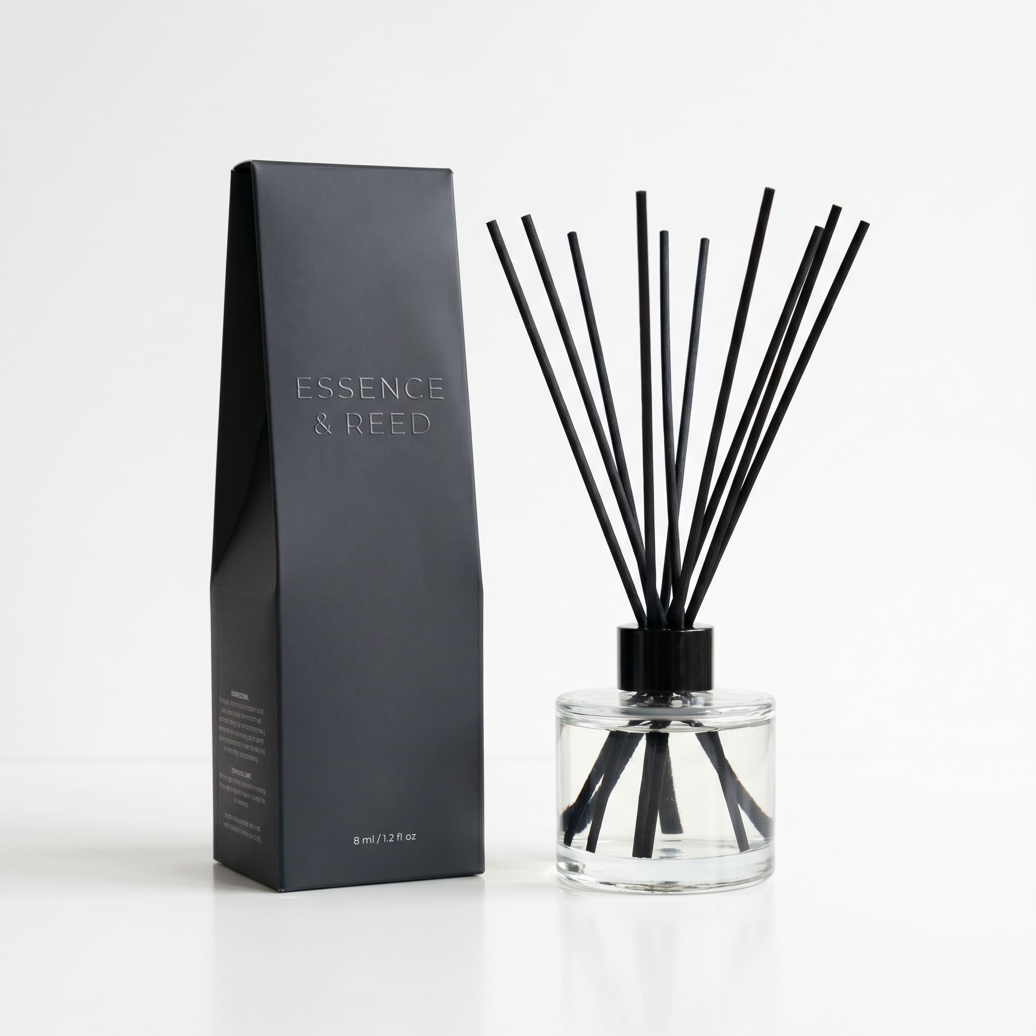 Essence & Reed — тёмно-серая вырубная коробка с конгревным тиснением для ароматического диффузора
