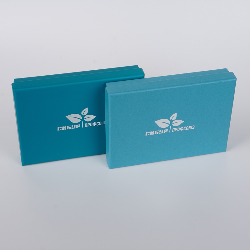 Сибур Профсоюз — две бирюзовые коробки разных оттенков