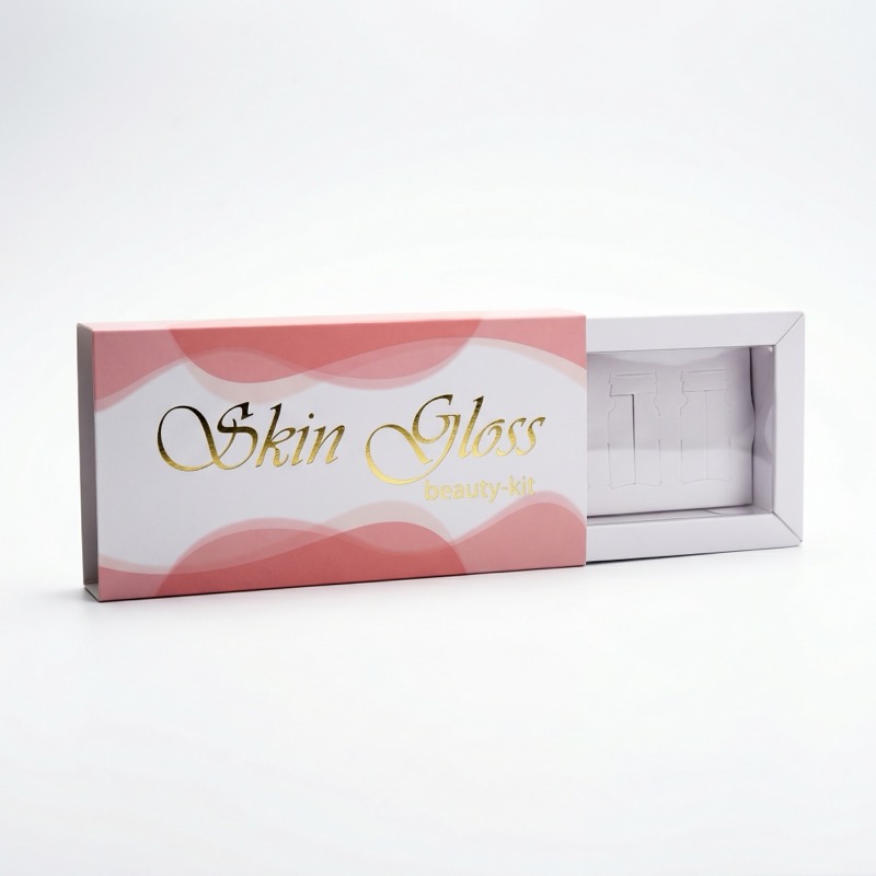 Skin Gloss — розовая коробка-шубер с золотым тиснением и ложементом