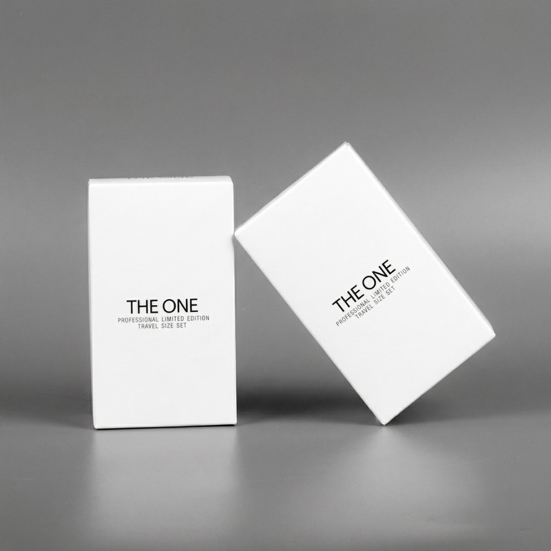 The One — белые вырубные коробки с минималистичной печатью