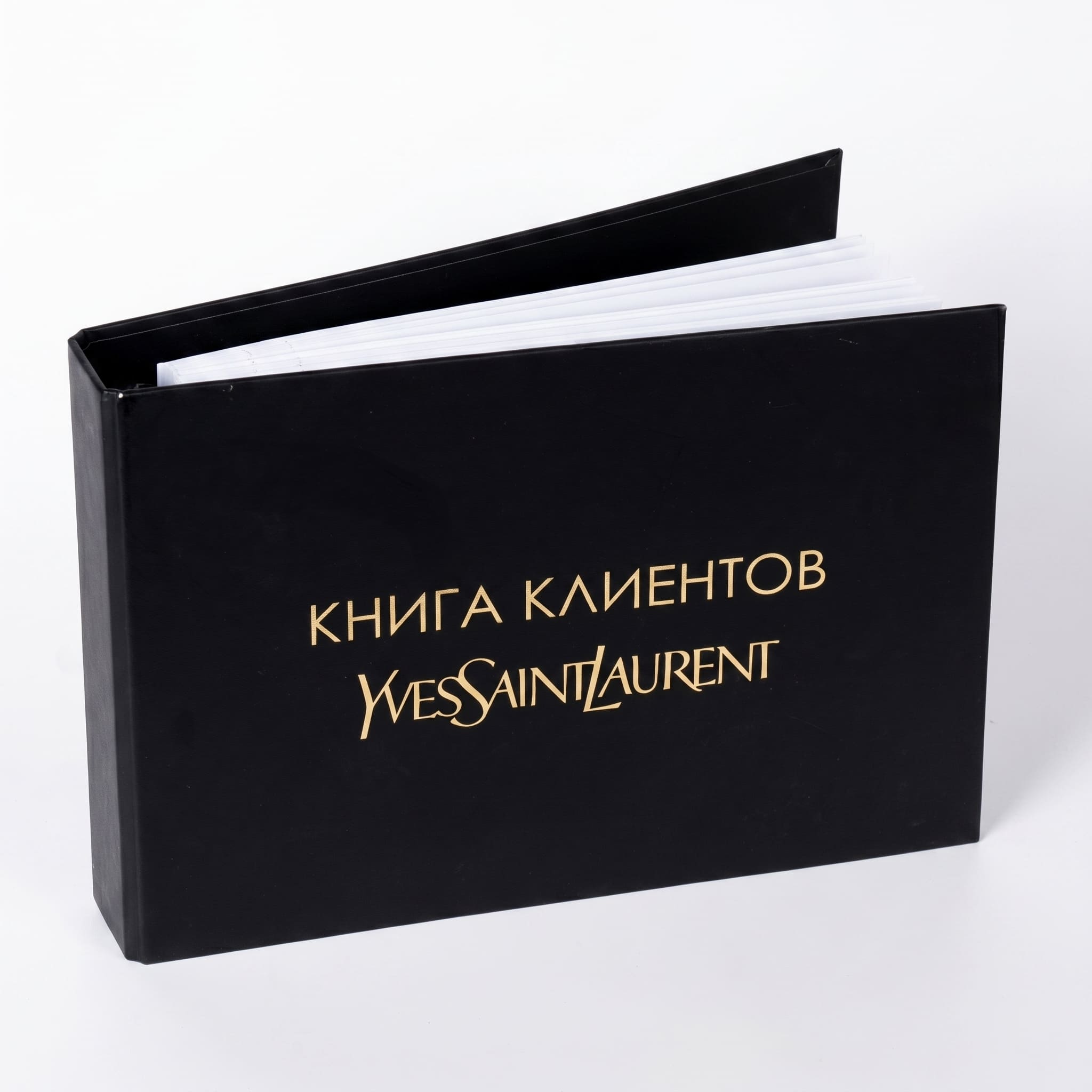 Yves Saint Laurent — книга клиентов с золотым тиснением